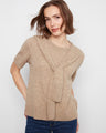 Beige sweater featuring a crew neckline, perfect for a casual day out. The soft knit fabric ensures comfort and style by Charlie B.