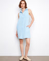 Light blue sleeveless dress with hidden pockets and button front, perfect for a casual day out by Charlie B.