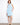 Light blue sleeveless dress with hidden pockets and button front, perfect for a casual day out by Charlie B.