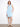 Light blue sleeveless dress with hidden pockets and button front, perfect for a casual day out by Charlie B.