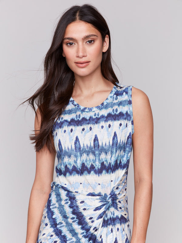 Faux knot detail adds elegance to the sleeveless cotton dress by Charlie B.