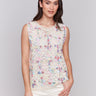 Natural crochet top featuring a unique abstract pattern by Charlie B.