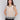 Natural color top with a crew neckline, perfect for any occasion by Charlie B.