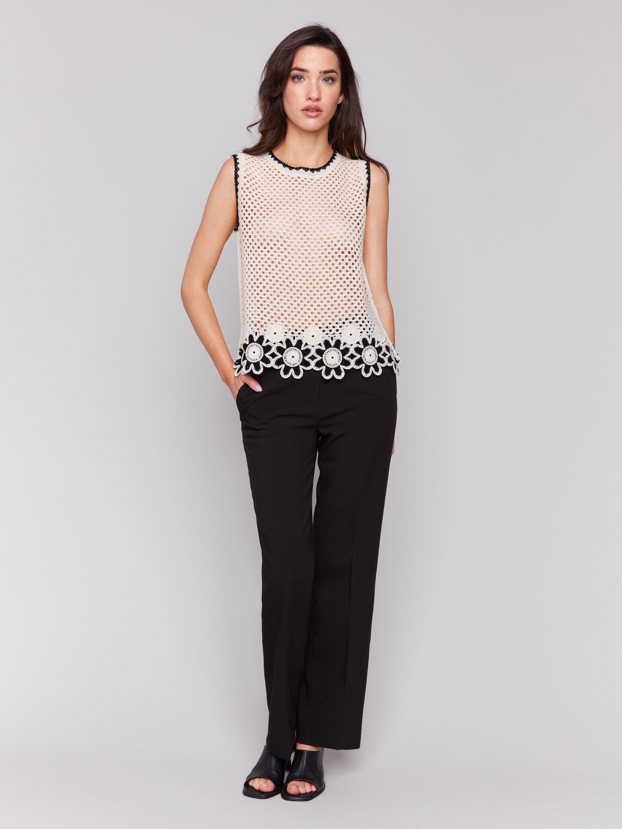 Cotton crochet top featuring a unique sleeveless design by Charlie B.