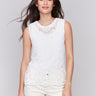 White crochet top with intricate floral pattern by Charlie B.