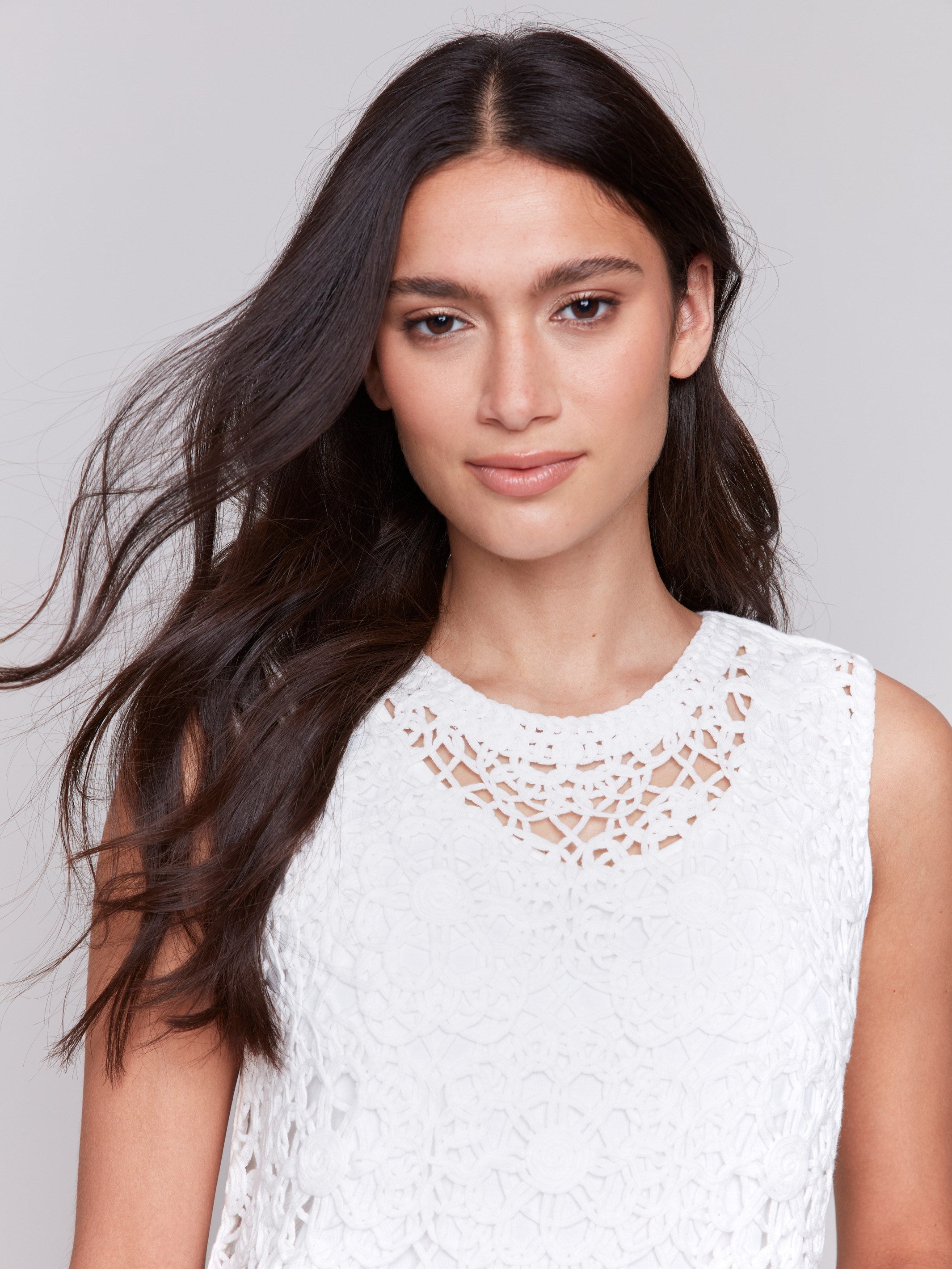 Floral crochet top featuring a sleeveless design by Charlie B.
