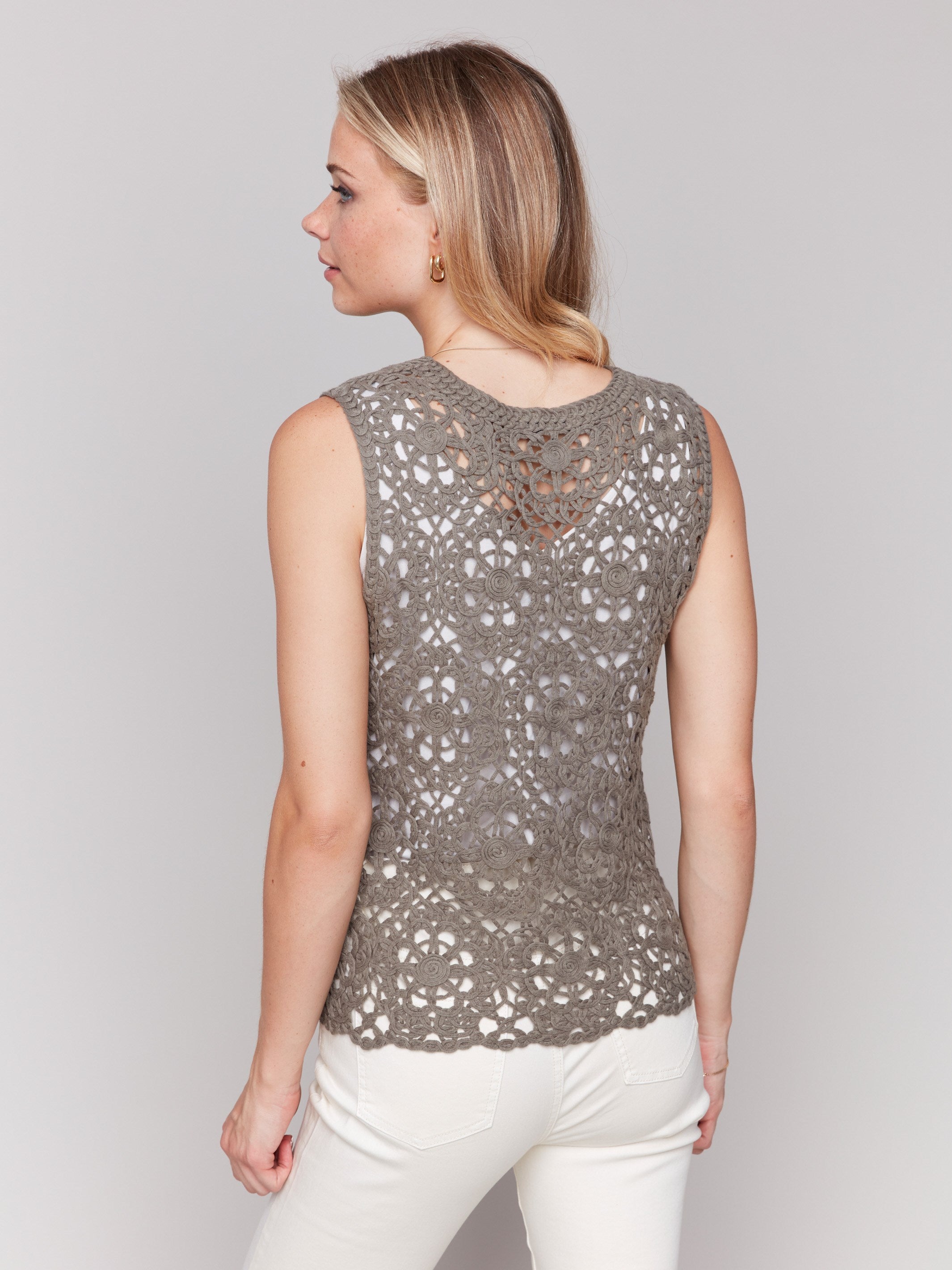 Floral crochet top with crew neckline in celadon by Charlie B.