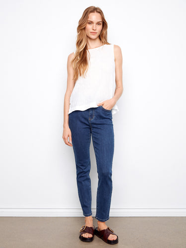 Stylish white top with unique side button detailing by Charlie B.