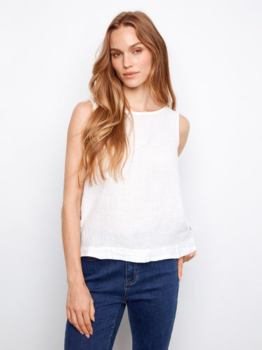White linen top with sophisticated high-low hem and button details by Charlie B.