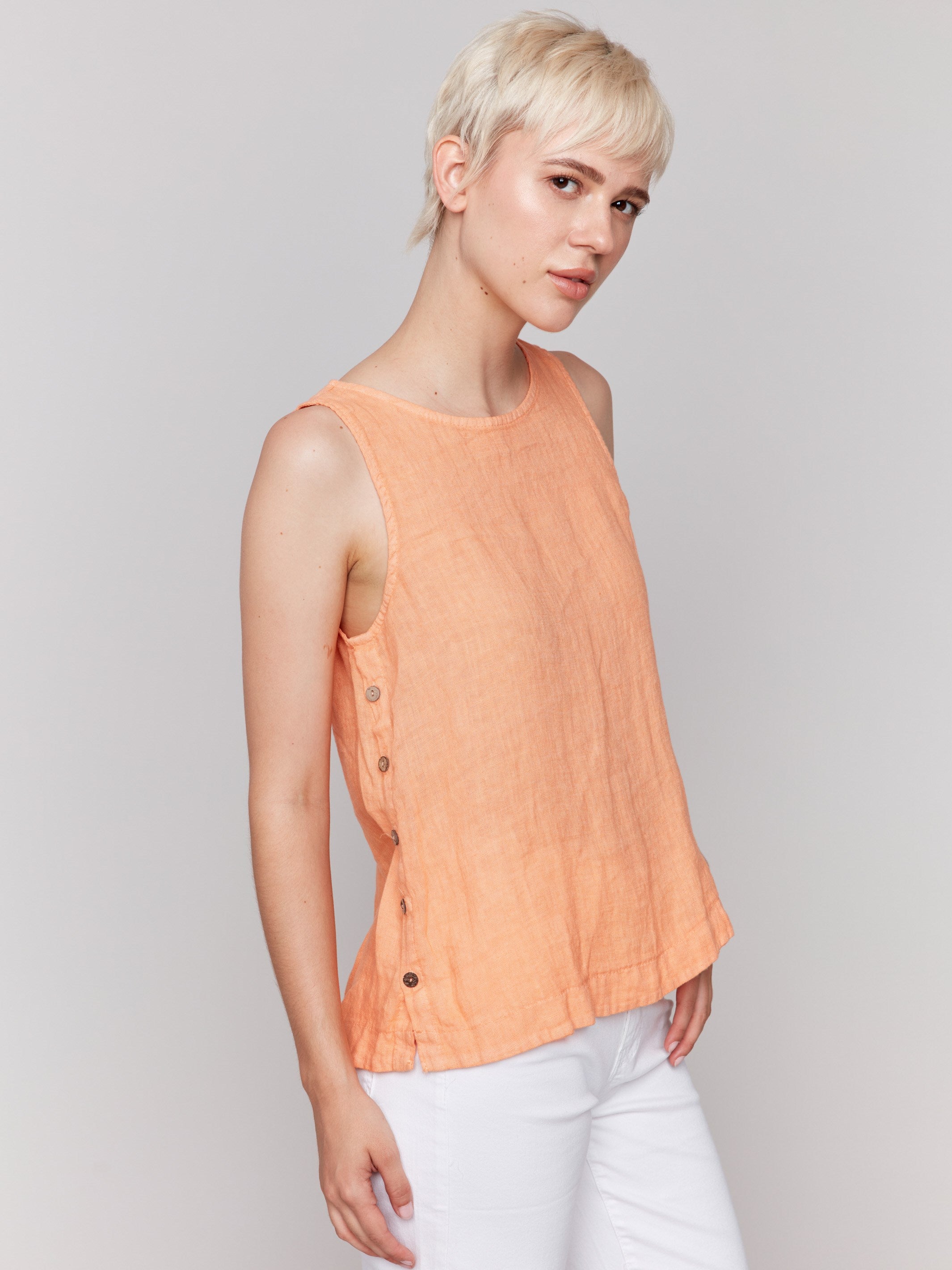 Linen tank top in papaya with a high-low hem by Charlie B.