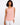 This sleeveless top features a scoop neckline and is crafted in a soft, blush pink fabric with side button detailing by Charlie B.
