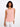 This sleeveless top features a scoop neckline and is crafted in a soft, blush pink fabric with side button detailing by Charlie B.