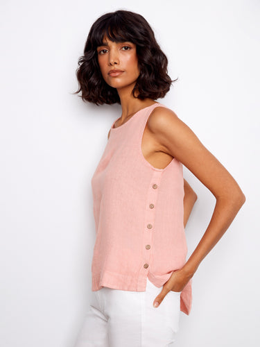 The side button detailing adds a unique touch to this sleeveless top, perfect for casual outings or dressing up by Charlie B.