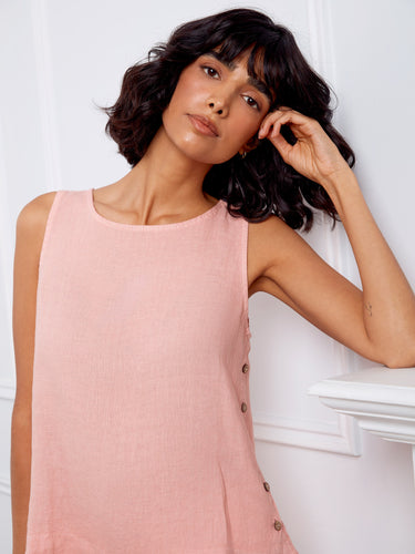 Crafted from lightweight fabric, this blush pink top features a flattering scoop neckline for an effortlessly chic look by Charlie B.