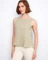 Linen top with a chic scoop neckline, perfect for warm days. The natural fabric offers breathability and comfort. By Charlie B.