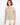 Linen top with a chic scoop neckline, perfect for warm days. The natural fabric offers breathability and comfort. By Charlie B.