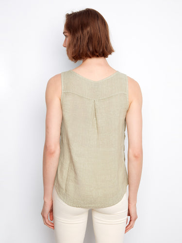 Side button detailing adds an elegant flair to this versatile linen piece, making it a must-have addition to any closet. By Charlie B.