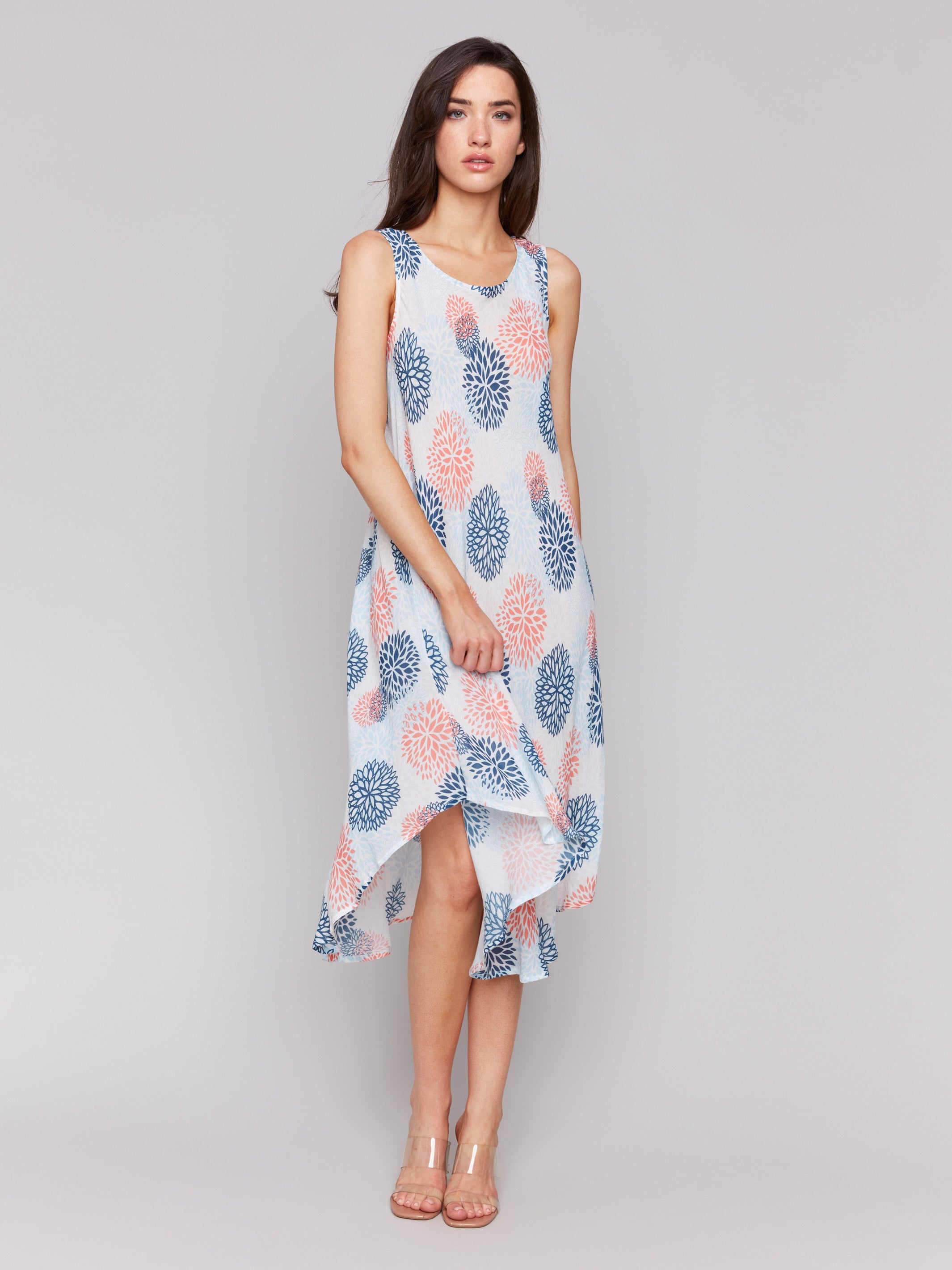 Midi length rayon dress featuring a vibrant abstract design in blue and pink by Charlie B.