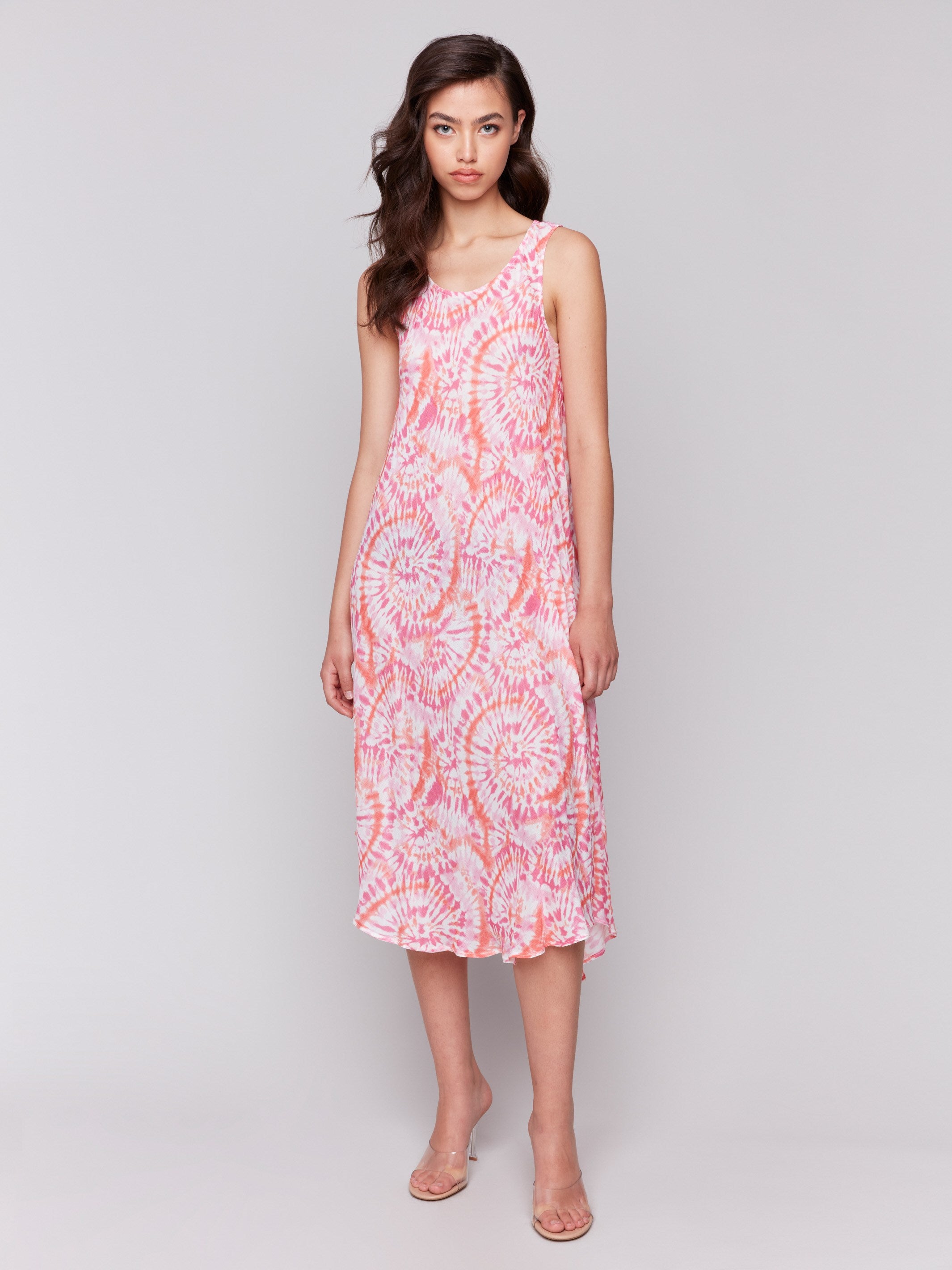 Flowy silhouette dress with a papaya tie-dye pattern by Charlie B.