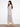 Maxi length striped dress with side slits adds a touch of elegance and freedom of movement to your wardrobe. By Charlie B.