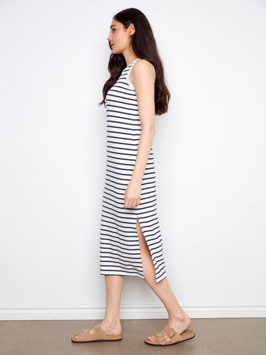 Maxi length striped dress with side slits adds a touch of elegance and freedom of movement to your wardrobe. By Charlie B.