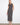 Black striped scuba dress with a flattering crew neckline and maxi length, perfect for any occasion by Charlie B.
