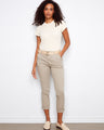 These pants feature a slim fit for a sleek silhouette, perfect for any casual outing. By Charlie B.