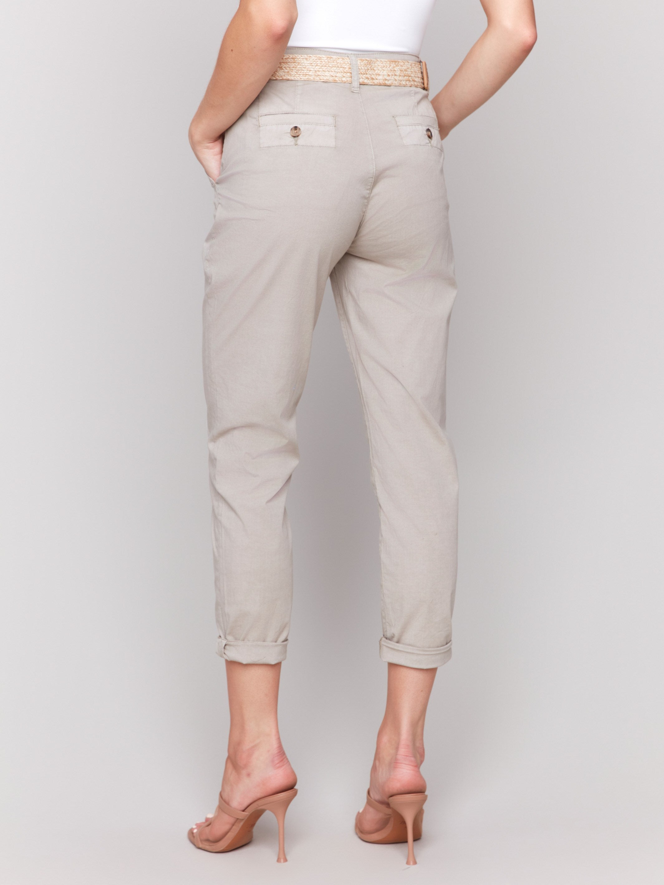 Chic greige pants with a woven belt, offering a sleek slim leg style by Charlie B.