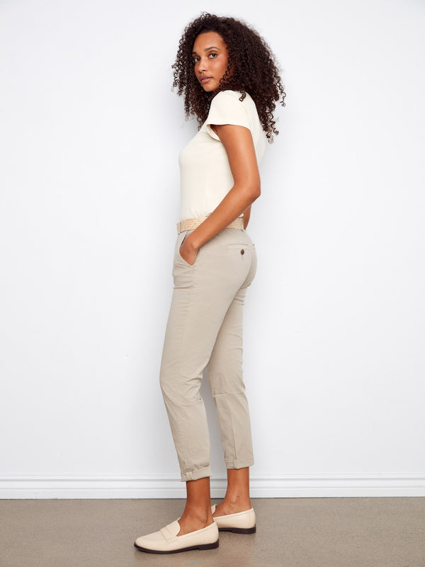 Cropped length adds a modern touch to these versatile pants, ideal for any occasion. By Charlie B.