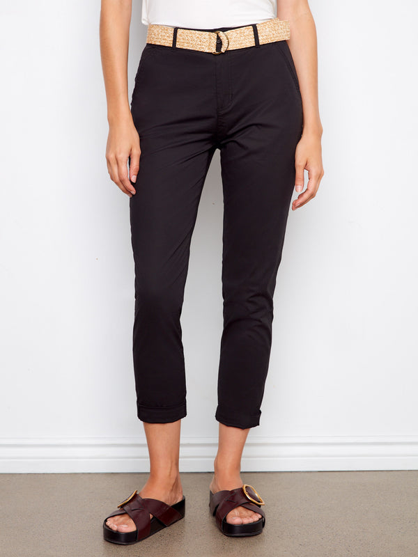 Black cropped length pants with a belt, perfect for a modern look by Charlie B.