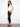 Black slim-fit pants featuring regular rise and an included belt by Charlie B.