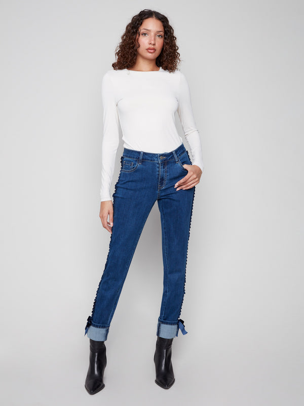 Indigo jeans featuring a stylish slim fit and folded hem, perfect for a chic look by Charlie B.