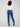 Indigo denim jeans designed with five-pocket styling, ensuring both practicality and style by Charlie B.