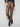 These pants feature a sleek five-pocket design in a copper metallic finish, perfect for versatile styling by Charlie B.