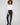 Black pants with a slim fit and ankle-length cut, featuring a chic metallic sheen by Charlie B.
