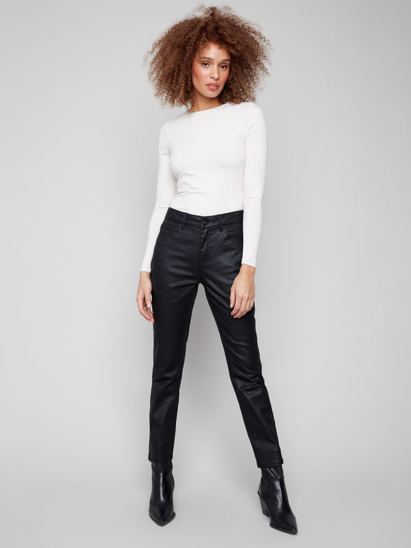 Black slim-fit pants crafted from premium materials for a polished look by Charlie B.