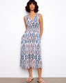 This dress features a V-neck design and wide straps, offering a stylish yet comfortable fit for any occasion. By Charlie B.