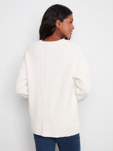 Relaxed fit ecru sweater crafted from soft boucle material, ideal for layering with its long sleeves by Charlie B.