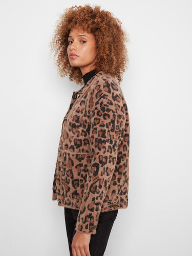 Soft textured leopard print jacket with button closure, offering both style and comfort by Charlie B.