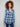 Blue plaid blouse featuring a classic shirt collar, adding a timeless touch to the design by Charlie B.