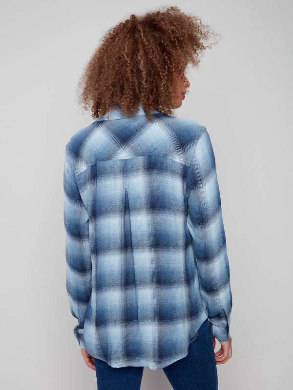 Stylish shirt featuring a classic collar and long sleeves in a chic blue plaid pattern by Charlie B.