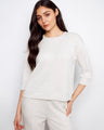 Elevate your look with this piece's unique blanket stitch detailing, blending simplicity with sophistication by Charlie B.
