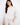 Elevate your look with this piece's unique blanket stitch detailing, blending simplicity with sophistication by Charlie B.
