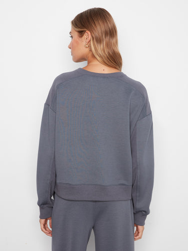 The ribbed cuffs and hem add a touch of classic detailing to this cozy soft scuba fabric top by Charlie B.