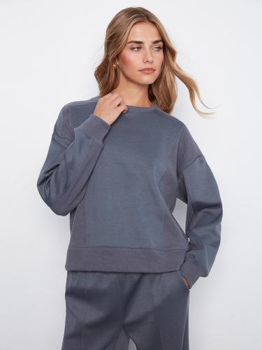 Designed with a relaxed fit, this soft scuba fabric sweatshirt combines comfort with effortless style by Charlie B.