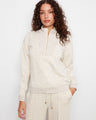 Soft scuba fabric creates a cozy feel in this stylish half-zip mock neck top, perfect for any casual occasion. By Charlie B.