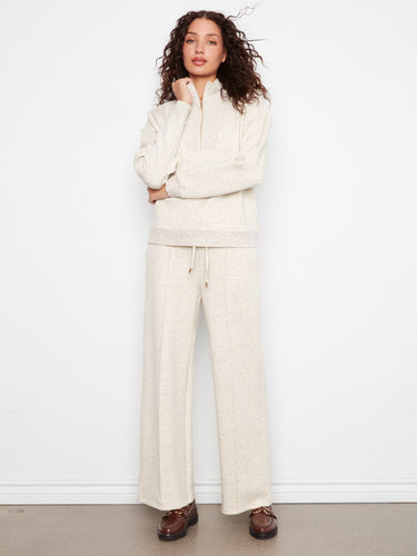 Stay comfortable with the relaxed fit and ribbed cuffs of this versatile top, ideal for layering or wearing alone. By Charlie B.