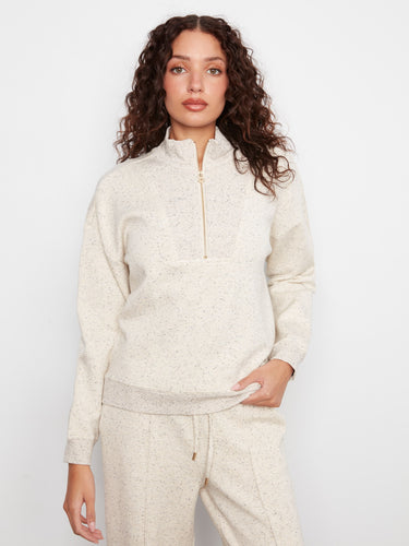 This half-zip mock neck features long sleeves and a relaxed fit, making it an essential piece for cozy days. By Charlie B.