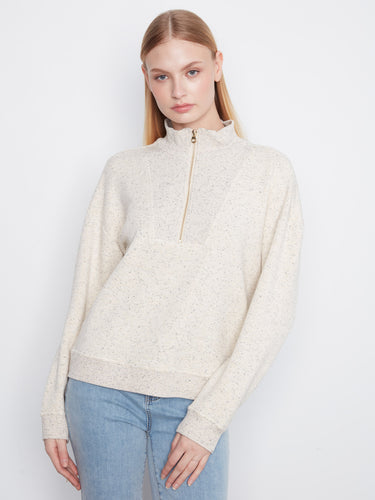 Half-zip closure adds versatility to this relaxed-fit top with ribbed cuffs, perfect for transitioning between seasons. By Charlie B.
