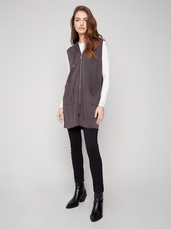Mocha vest featuring mid-thigh length and zip front, complete with a hood for versatile styling by Charlie B.